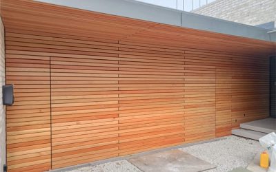 Enhanced garage with a door that was durable, attractive, and easy to operate